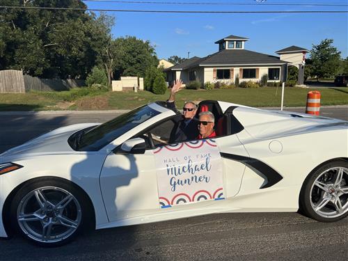 hall of fame recipient Michael Gunner in convertible